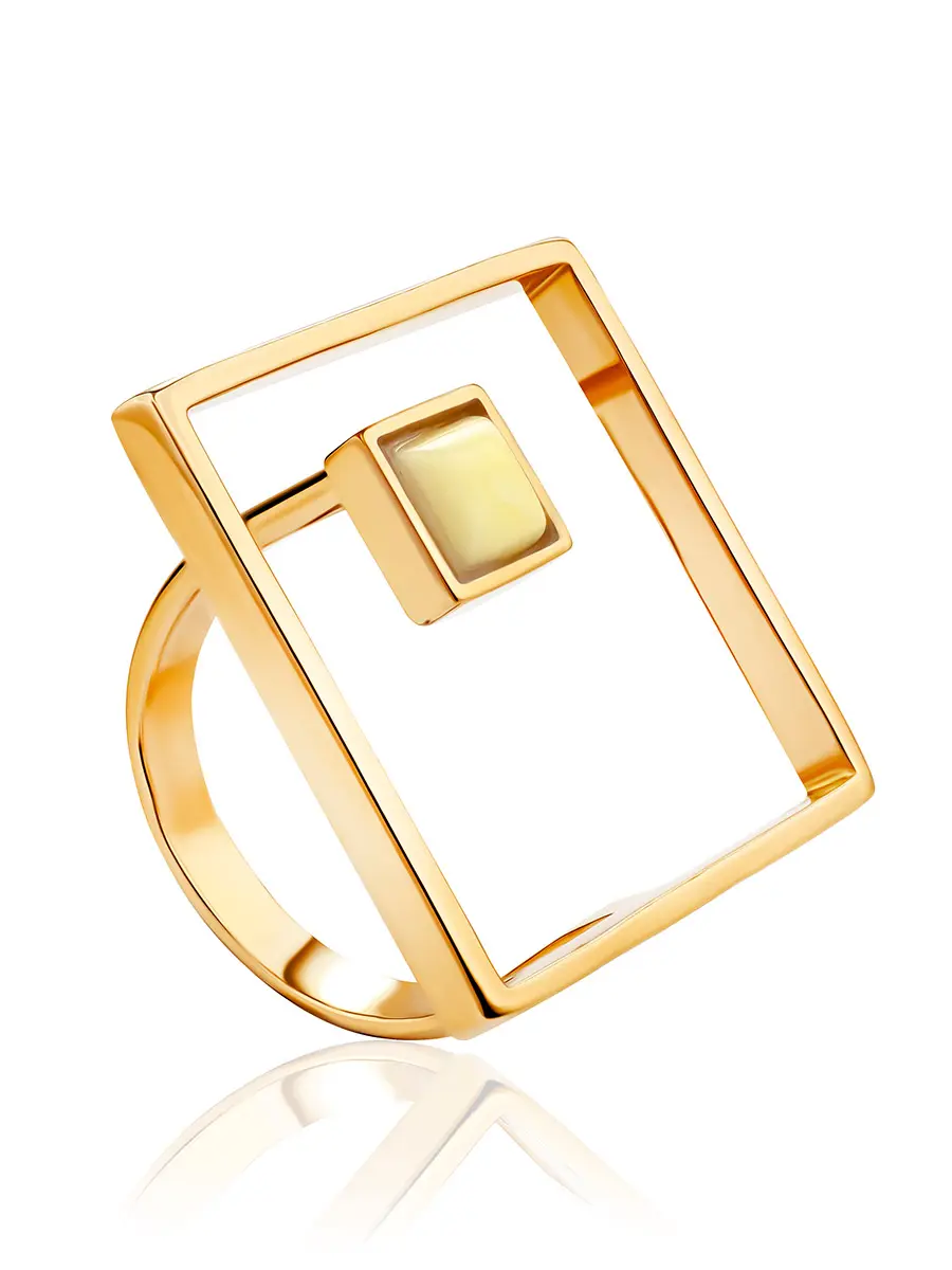 картинка Стильное позолоченное кольцо с медовым янтарём «Гравитация» в онлайн магазине