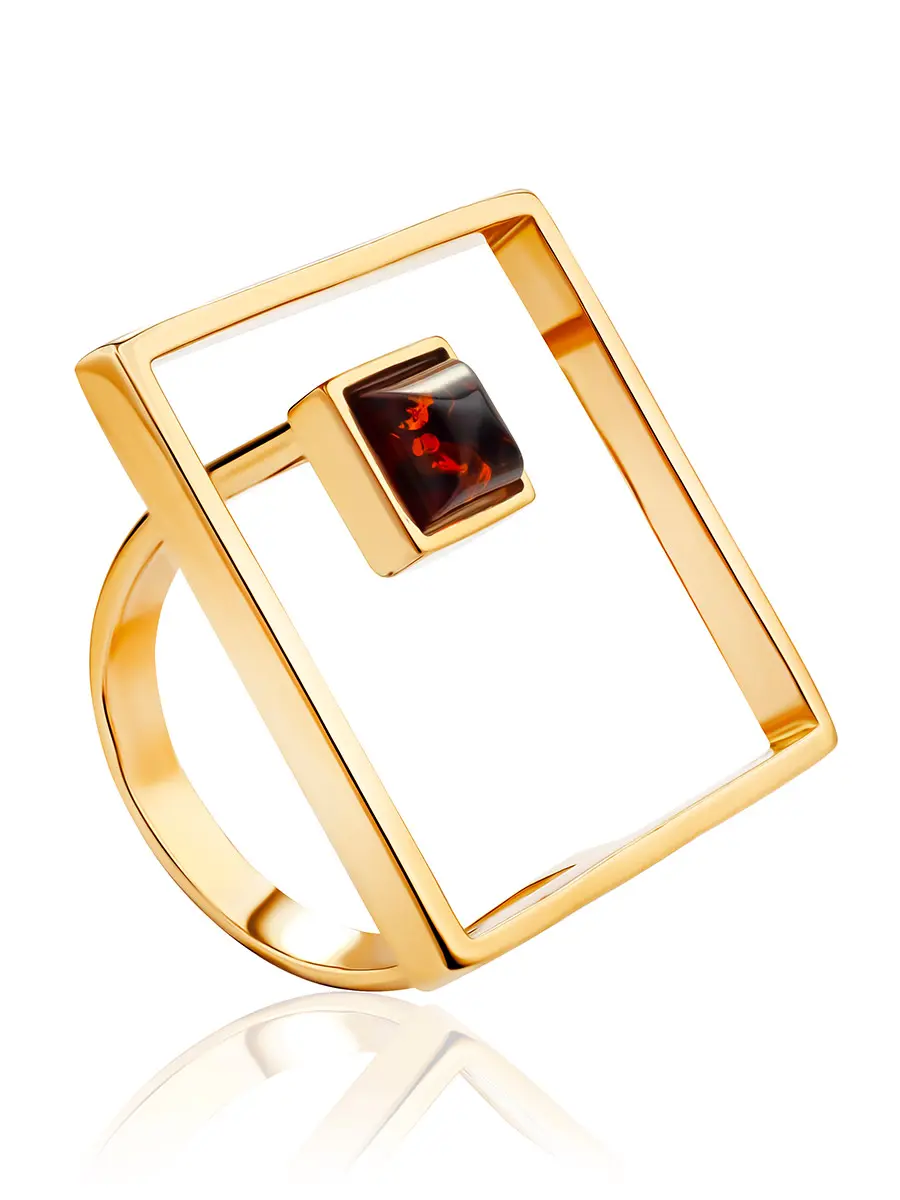 картинка Крупное необычное кольцо с коньячным янтарём «Гравитация» в онлайн магазине