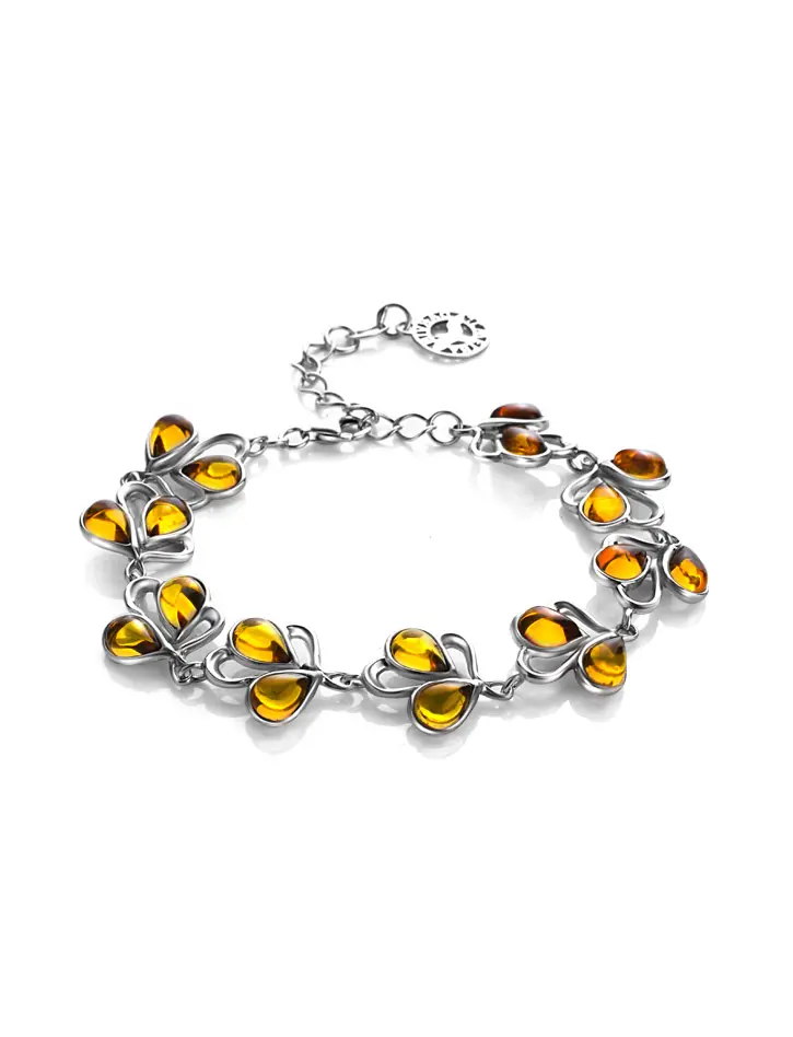 картинка Красивый браслет из серебра с и цельного лимонного янтаря «Ландыш» в онлайн магазине
