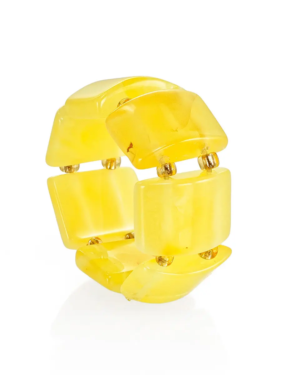 картинка Кольцо из янтаря светло-медового цвета на резинке в онлайн магазине
