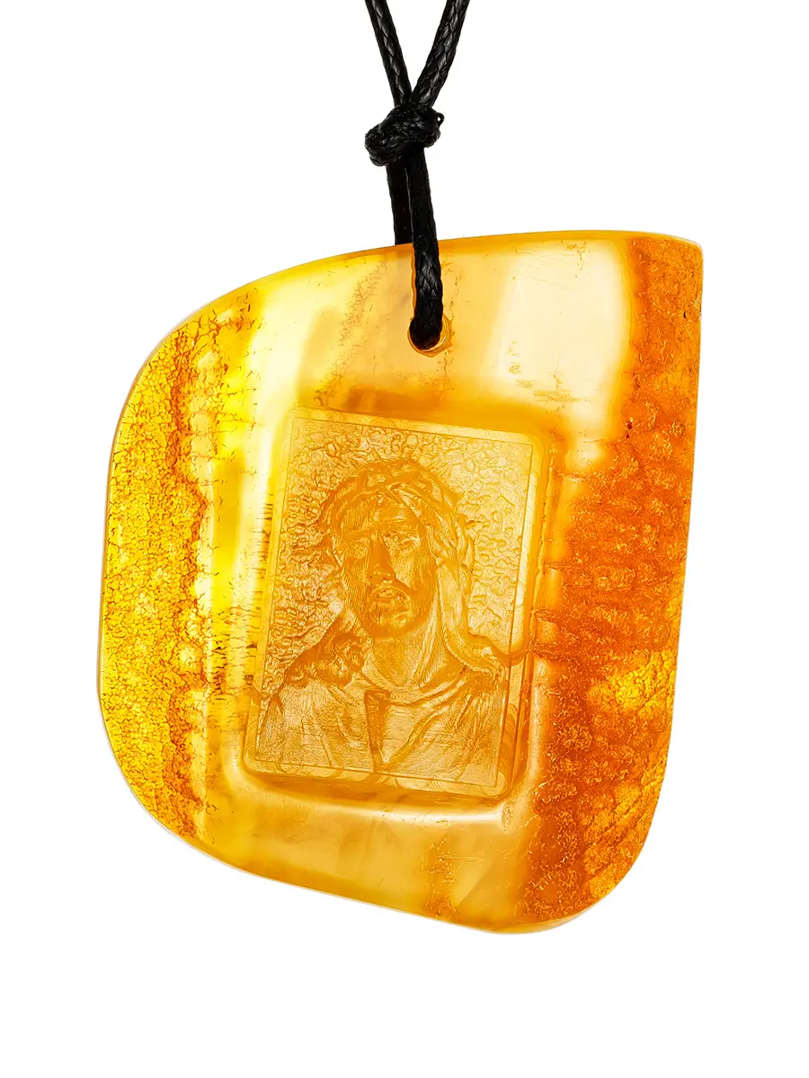 картинка Кулон из цельного янтаря медового цвета с резьбой «Христос в терновом венце» в онлайн магазине