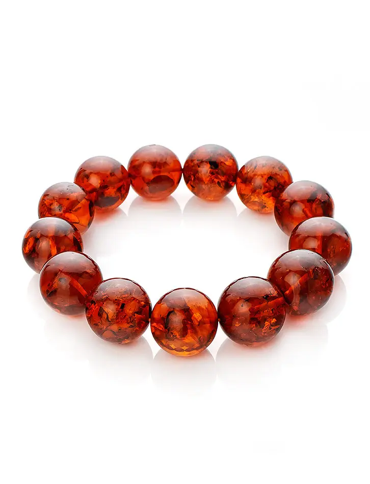картинка Объёмный браслет из натурального янтаря вишнёвого цвета «Юпитер» в онлайн магазине