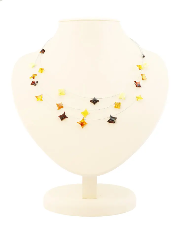 картинка Легкое колье на трех струнах с натуральным лимонным, коньячным и вишневым янтарем «Росинки звёздочки» в онлайн магазине