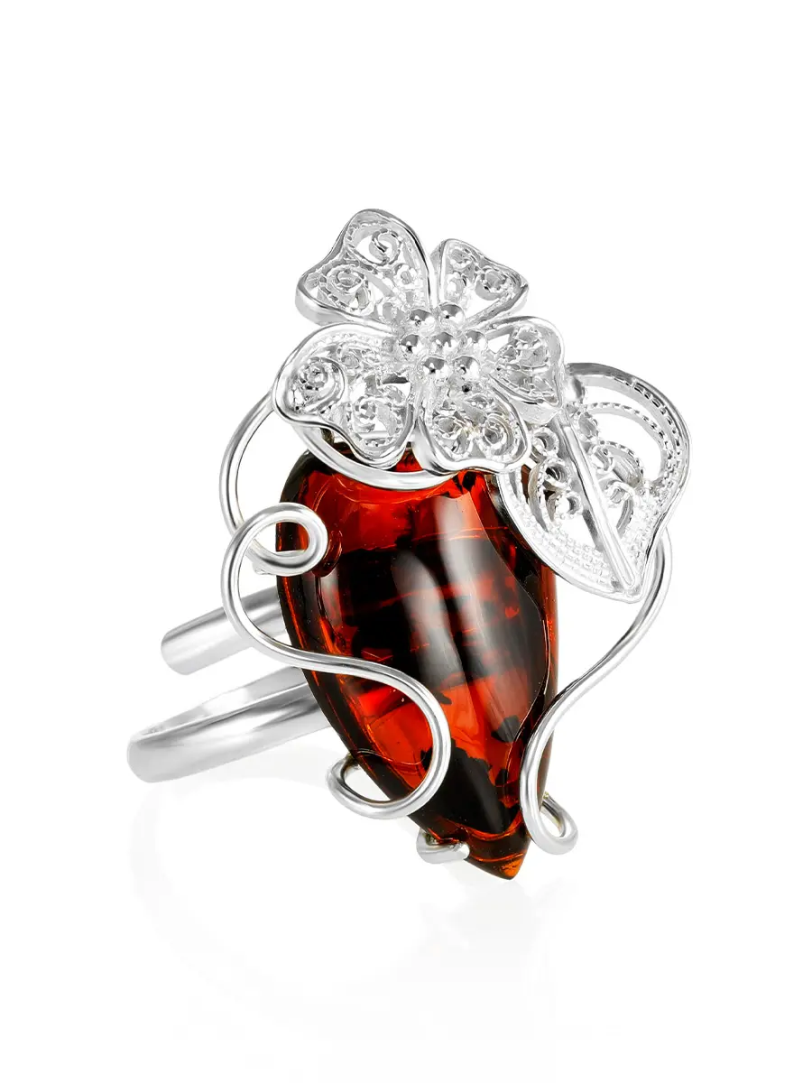 картинка Крупное серебряное кольцо с натуральным искрящимся янтарем «Филигрань» в онлайн магазине