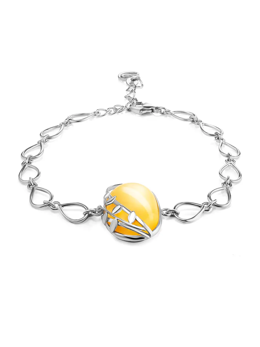 картинка Изящный серебряный браслет с янтарем медового цвета «Зверобой» в онлайн магазине