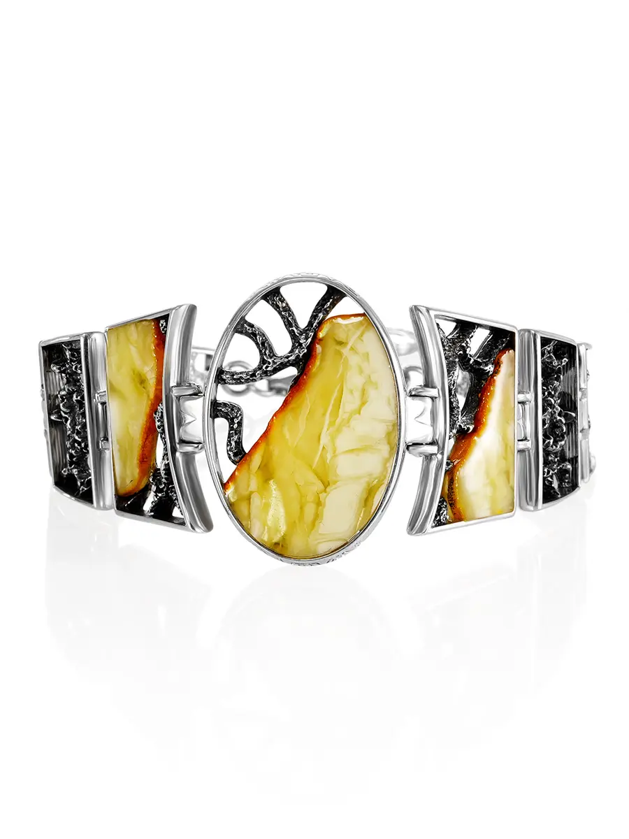 картинка Стильный серебряный браслет с цельными кусочками пейзажного янтаря «Модерн» овальный в онлайн магазине
