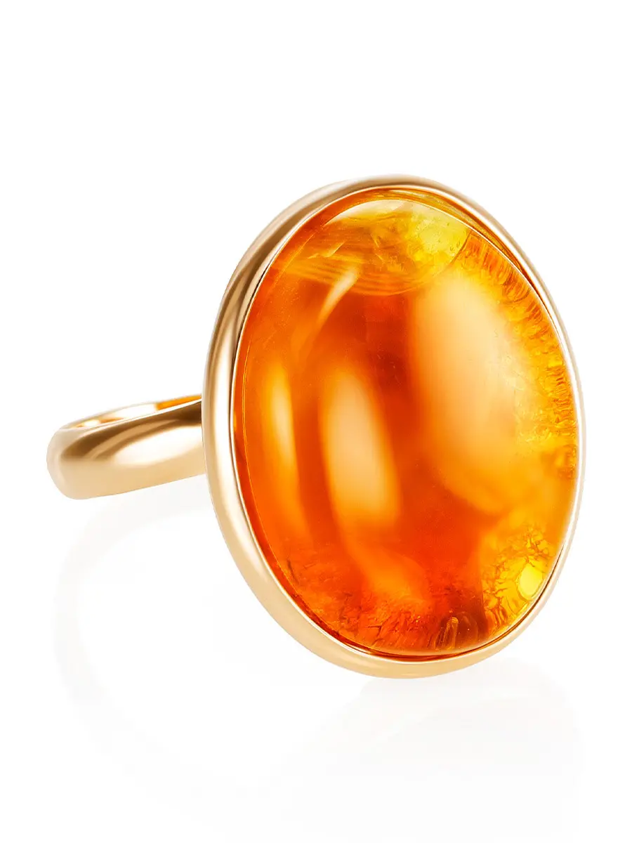 картинка Яркое кольцо из натурального янтаря с красивой текстурой в онлайн магазине