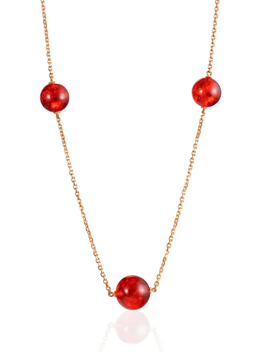 картинка Позолоченное колье с шариками-проставками из янтаря алого цвета «Олимпия» в онлайн магазине