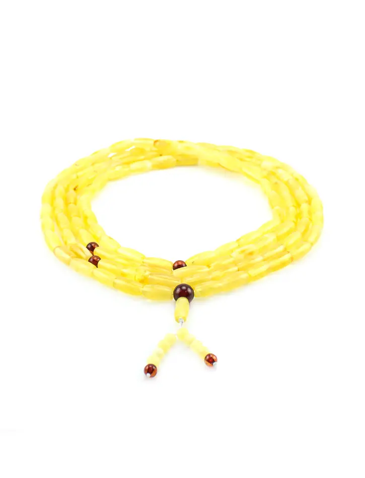 картинка Длинные янтарные четки медового цвета из бусин-цилиндров в онлайн магазине