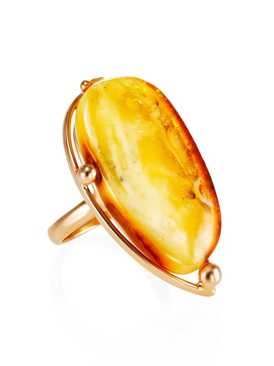 картинка Эффектное кольцо из серебра с позолотой и янтаря с красивой текстурой «Маньяна» в онлайн магазине
