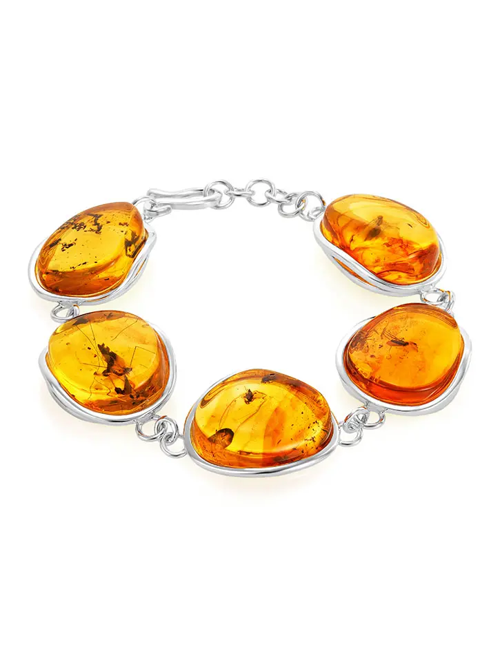 картинка Яркий необычный браслет из янтаря с инклюзами и серебра «Клио» в онлайн магазине