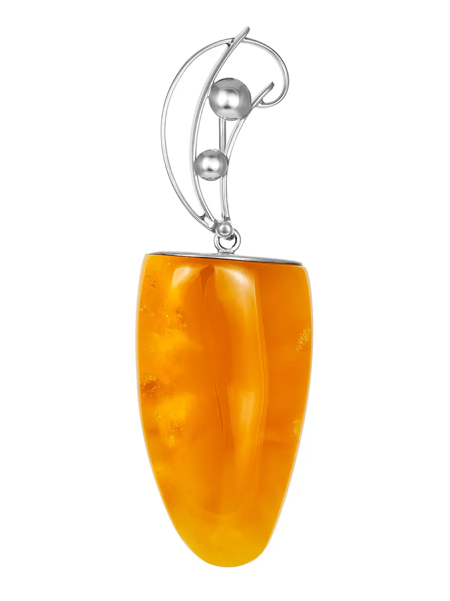 картинка Крупная янтарная подвеска медового цвета с оригинальным креплением в онлайн магазине