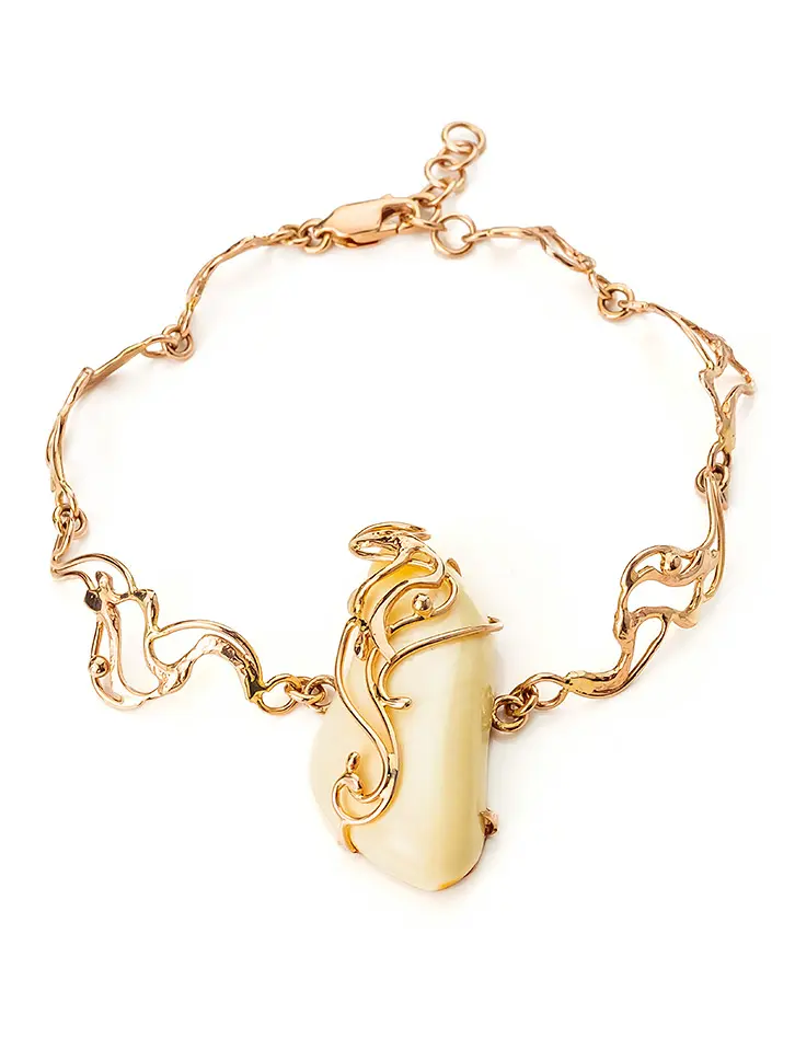 картинка Изящный золотой браслет с небольшой вставкой цельного янтаря «Версаль» в онлайн магазине