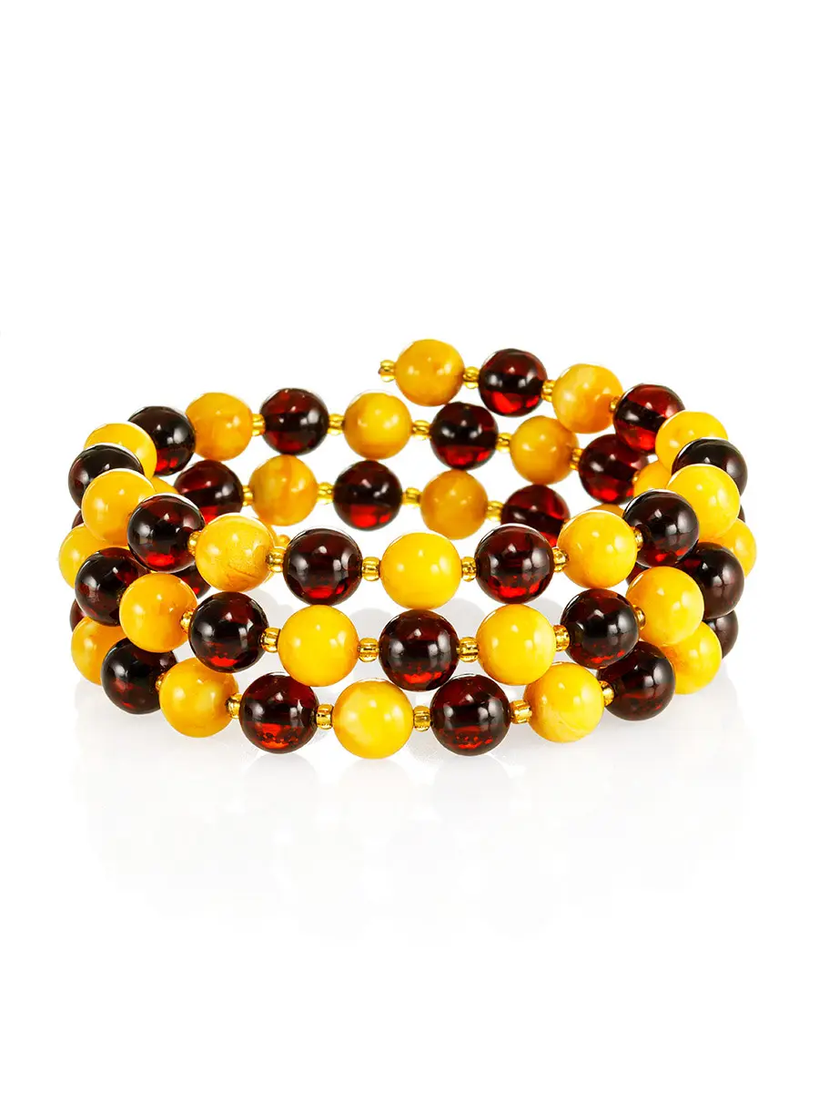 картинка Яркий браслет «Анжелика» из натурального формованного балтийского янтаря вишнёвого и медового цветов на струне в онлайн магазине