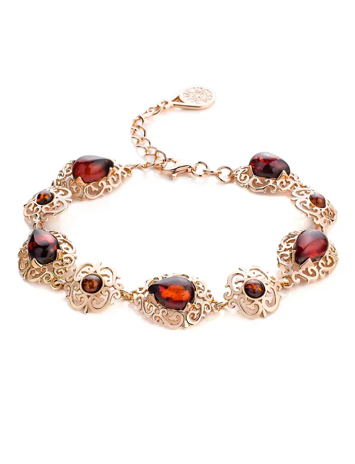 картинка Роскошный позолоченный браслет с натуральным вишнёвым янтарём «Луксор» в онлайн магазине