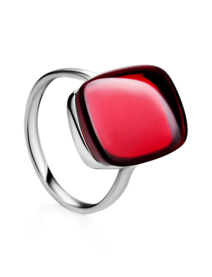 картинка Стильное кольцо «Сангрил» из серебра с натуральным янтарём красного цвета в онлайн магазине