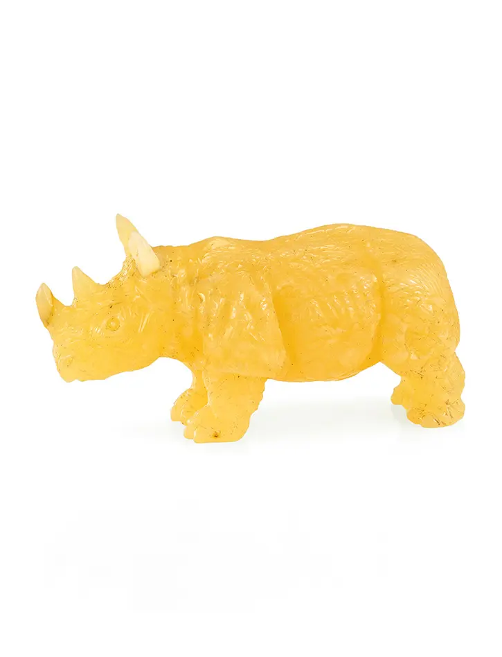 картинка Резная фигурка из натурального балтийского янтаря медового цвета «Носорог» в онлайн магазине