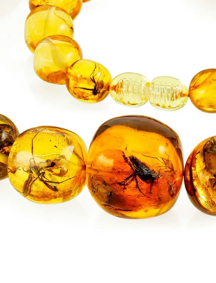 картинка Уникальные бусы из натурального янтаря с инклюзами «Лимонный мятый шар» в онлайн магазине