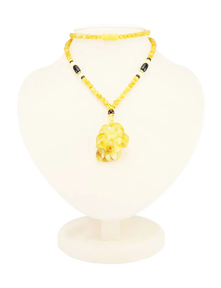 картинка Бусы из натурального состаренного медового янтаря с крупной резной подвеской «Цветок» в онлайн магазине