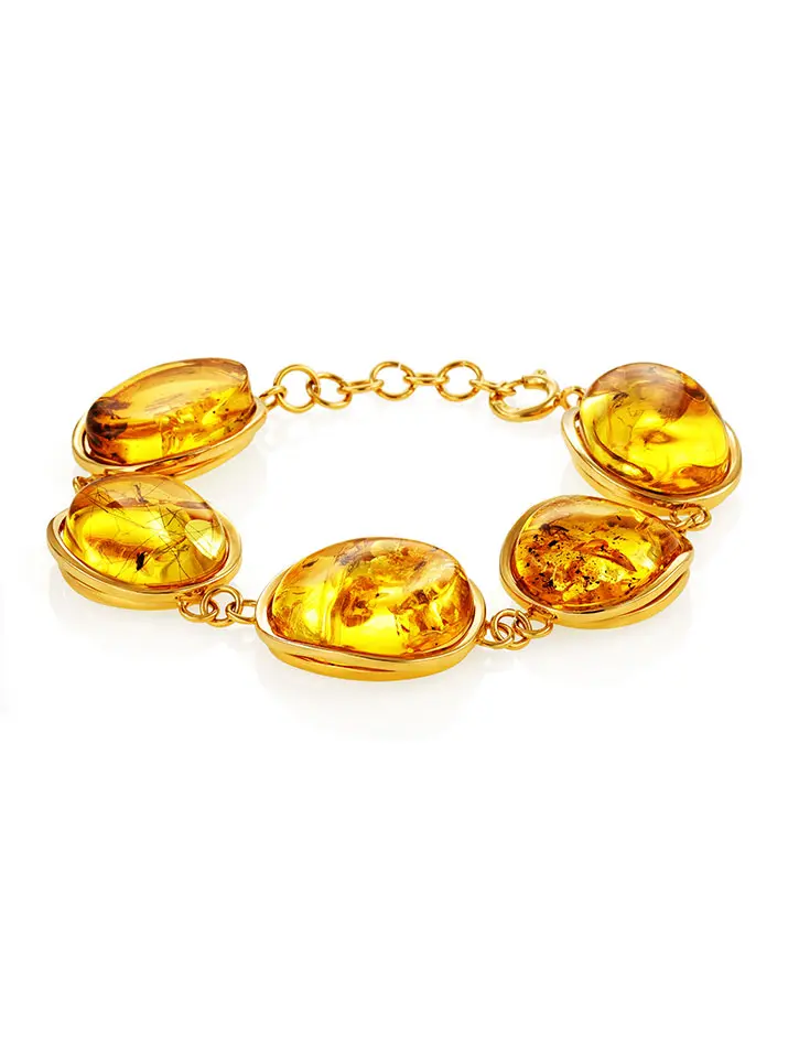 картинка Яркий и эксклюзивный браслет из золочённого серебра и янтаря с инклюзами «Клио» в онлайн магазине