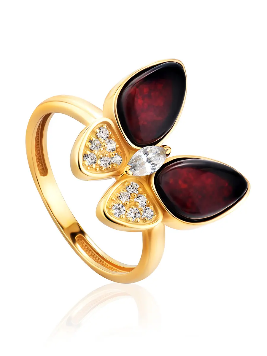 картинка Красивое кольцо из позолоченного серебра и тёмно-вишнёвого янтаря «Апрель» в онлайн магазине