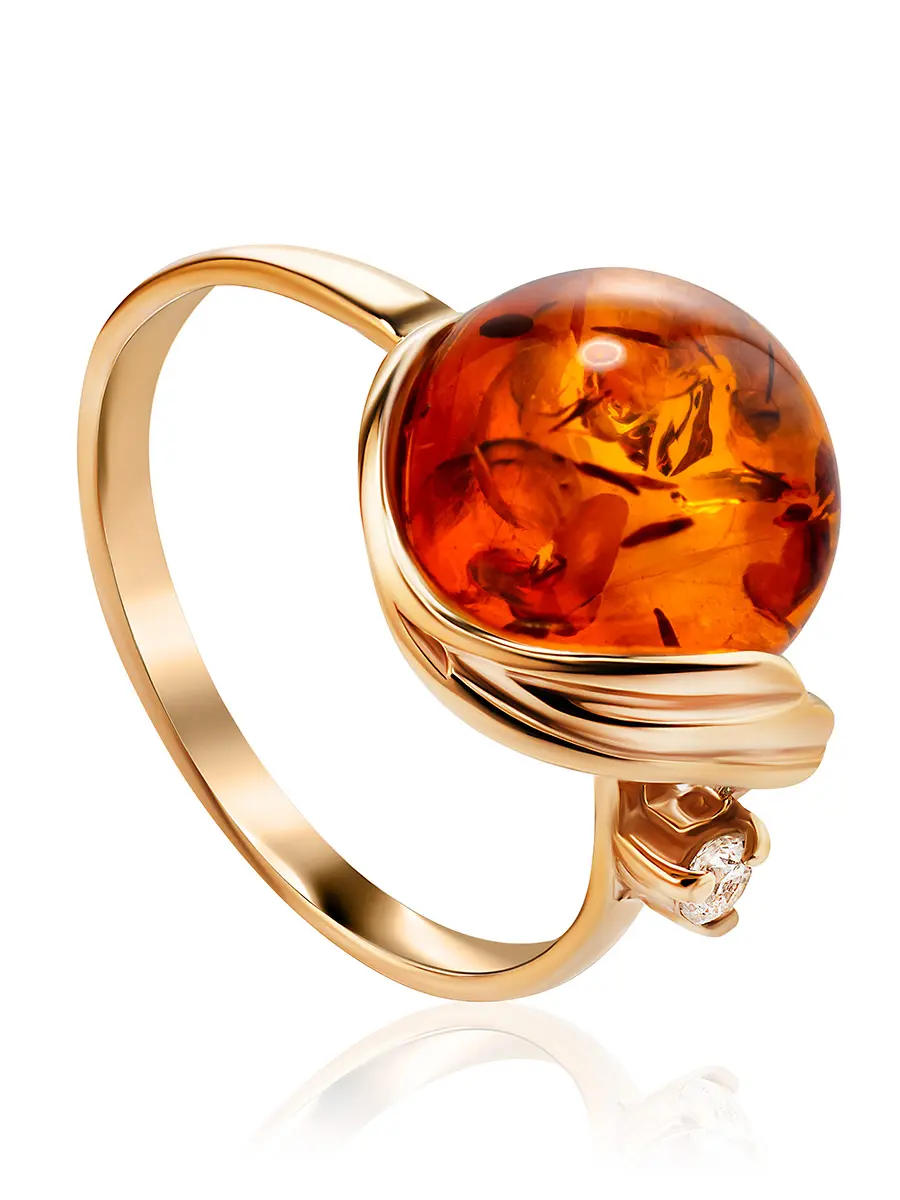 картинка Нарядное кольцо «Лебедь» из золочёного серебра и янтаря в онлайн магазине