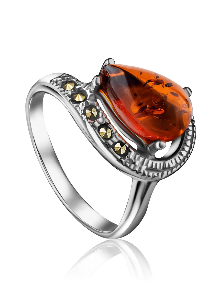 картинка Красивое кольцо из серебра с коньячным янтарём и марказитами «Эйфория» в онлайн магазине