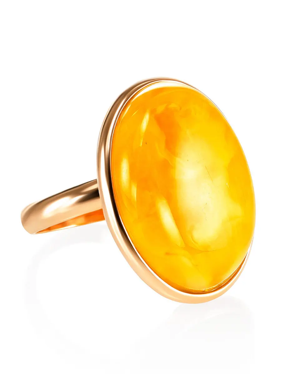 картинка Элегантное кольцо из позолоченного серебра и натурального янтаря медового цвета в онлайн магазине