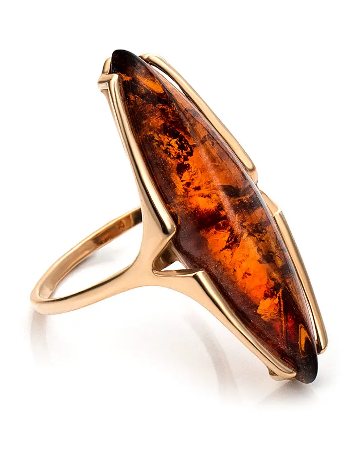 картинка Стильное кольцо из серебра с позолотой и коньячного янтаря «Барселона» в онлайн магазине