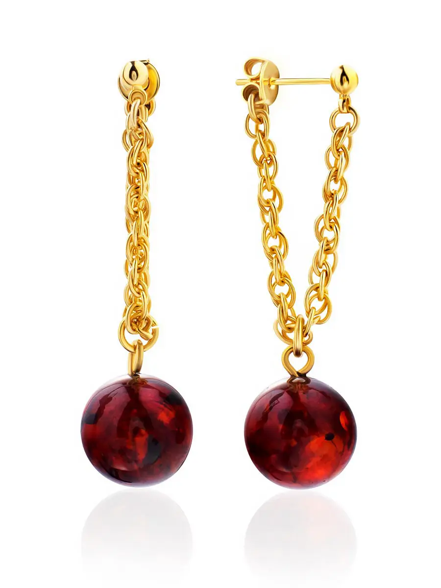 картинка Яркие серьги-гвоздики с натуральным янтарём на цепочке «Юпитер» в онлайн магазине