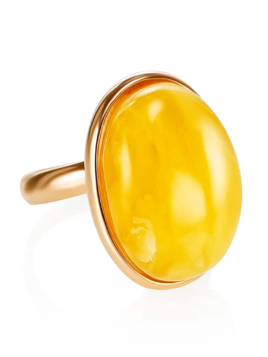 картинка Очаровательное позолоченное кольцо с ярко-медовым янтарём в онлайн магазине
