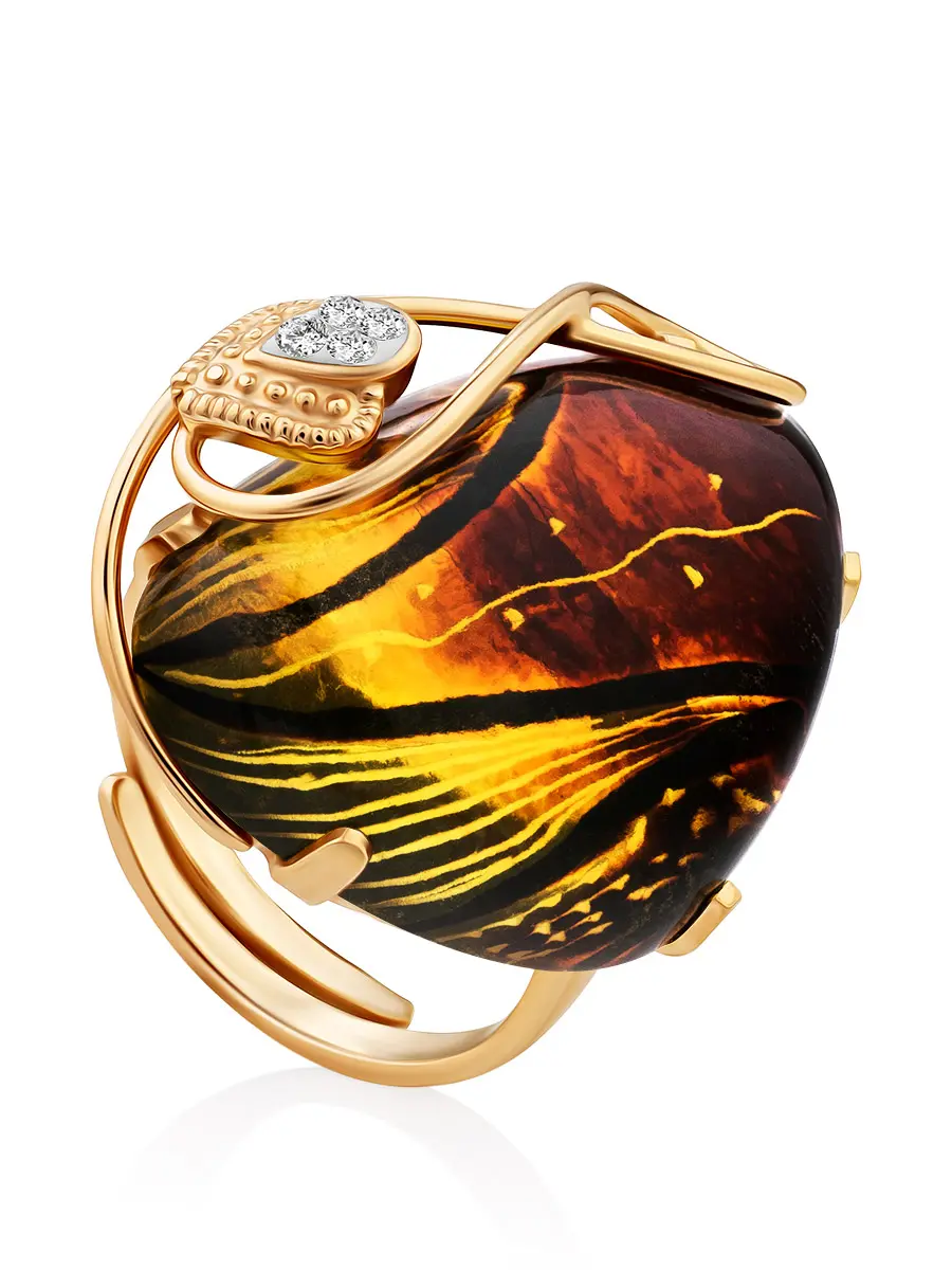 картинка Эффектное кольцо из натурального янтаря с резьбой «Одиссея» в онлайн магазине