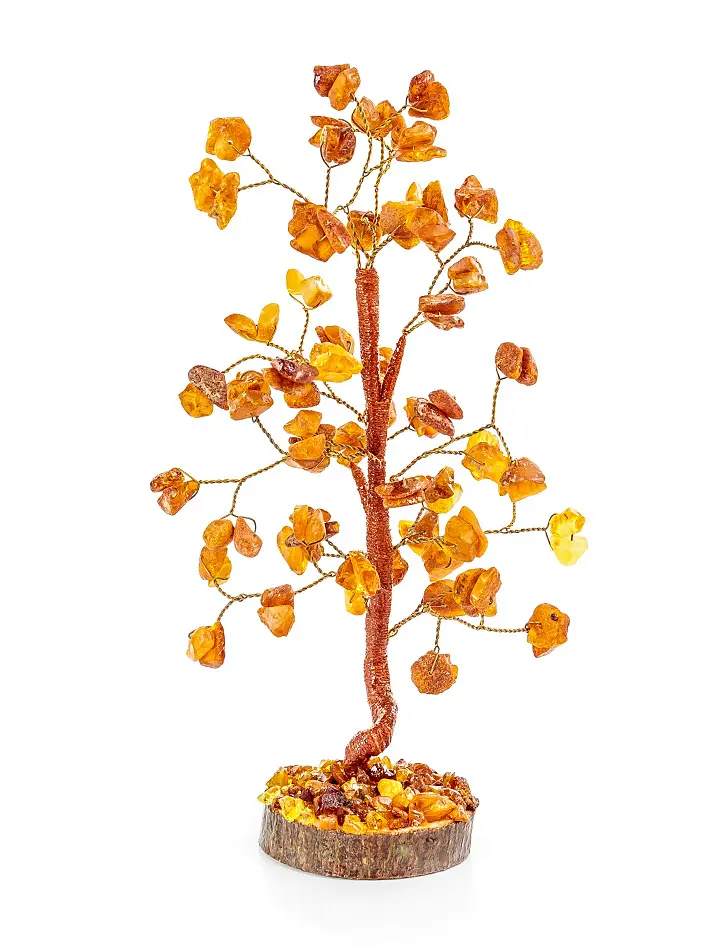 картинка Маленькое «Танцующее дерево» из янтаря на деревянной подставке в онлайн магазине