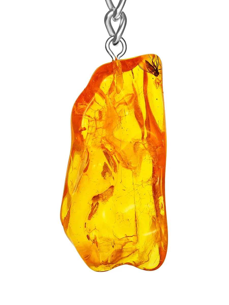 картинка Брелок с цельным крупным кусочком янтаря с инклюзом в онлайн магазине
