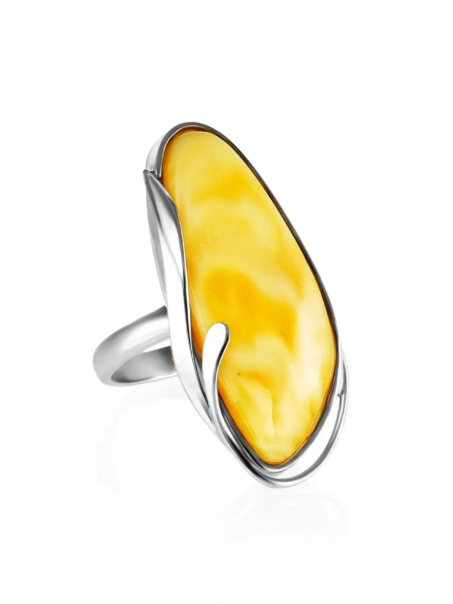 картинка Удлиненное кольцо из цельного медового янтаря с серебром «Маньяна» в онлайн магазине