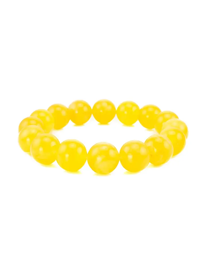 картинка Браслет «Янтарные шары» из крупных полупрозрачных бусин янтаря лимонно-медового цвета в онлайн магазине