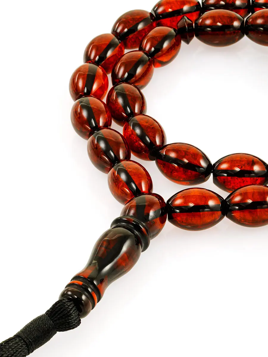 картинка Крупные мусульманские чётки на 33 бусины-оливки из натурального формованного янтаря вишнёвого цвета в онлайн магазине