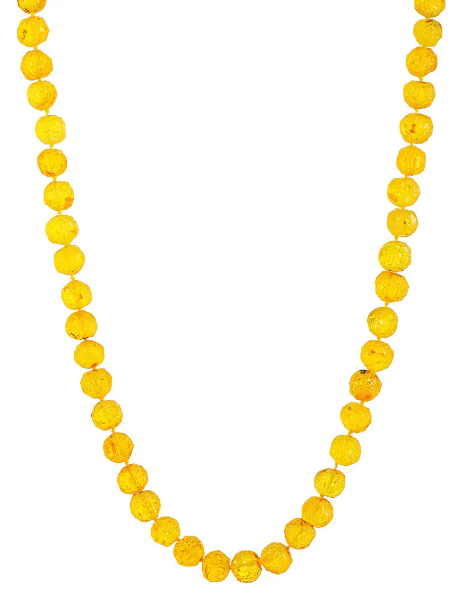 картинка Лечебные бусы из янтаря «Шар кусанка ярко-лимонная» в онлайн магазине