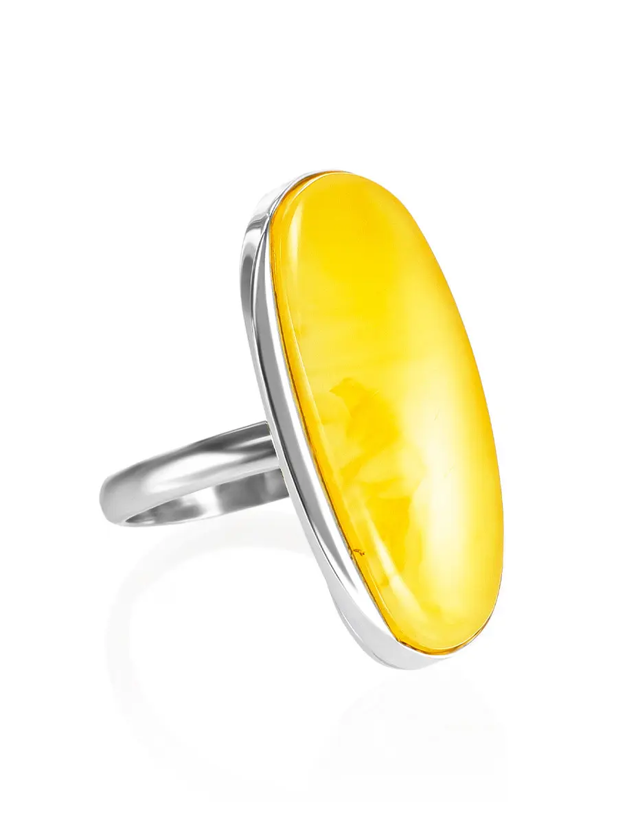 картинка Крупное серебряное кольцо с натуральным медовым янтарем «Лагуна» в онлайн магазине
