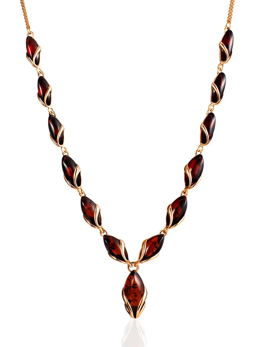 картинка Изящное позолоченное колье «Подснежник»с натуральным вишнёвым янтарём в онлайн магазине
