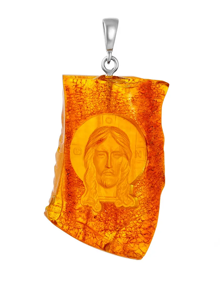 картинка Резной кулон из натурального цельного янтаря с корочкой «Спас» в онлайн магазине