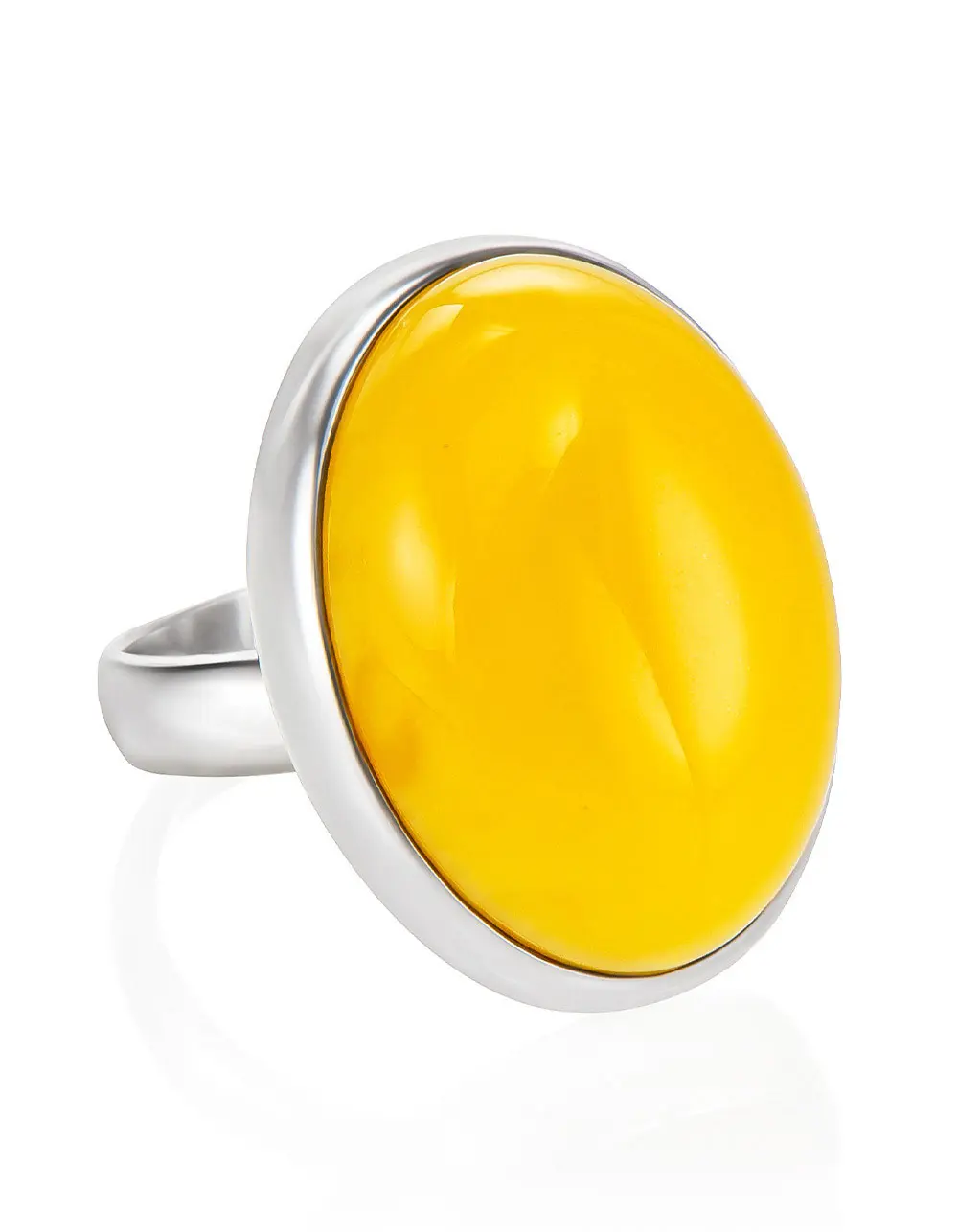 картинка Овальное кольцо из ярко-медового янтаря «Глянец» в онлайн магазине