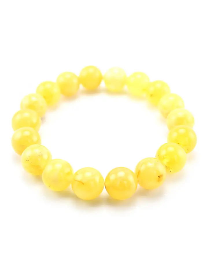 картинка Браслет из матовых янтарных бусин-шаров светло-лимонного оттенка в онлайн магазине