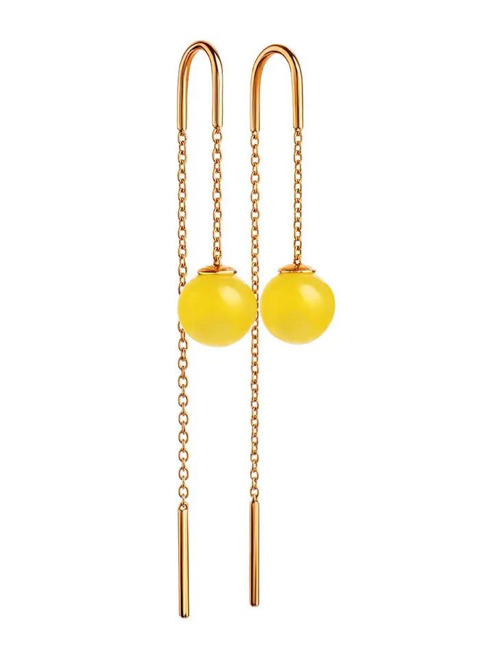 картинка Стильные серьги-продёвки «Юпитер» из золота с натуральным медовым янтарём в онлайн магазине