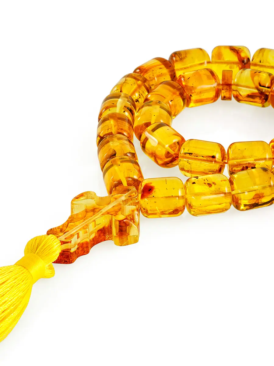 картинка Православные чётки на 33 бусины-бочонка из натурального золотистого янтаря с инклюзами в онлайн магазине