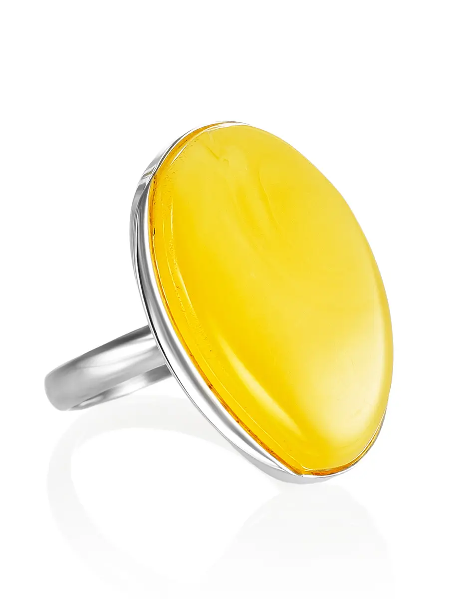 картинка Серебряное кольцо с вставкой из натурального нежно-медового янтаря «Лагуна» в онлайн магазине