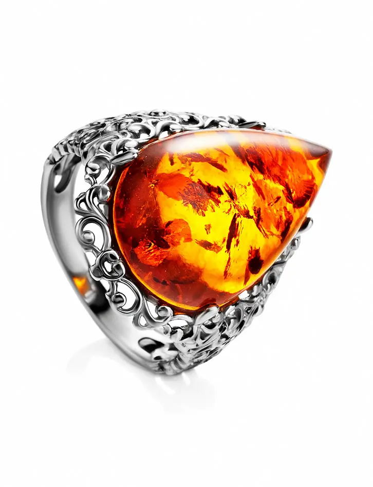 картинка Роскошное серебряное кольцо с янтарём коньячного цвета «Луксор» в онлайн магазине