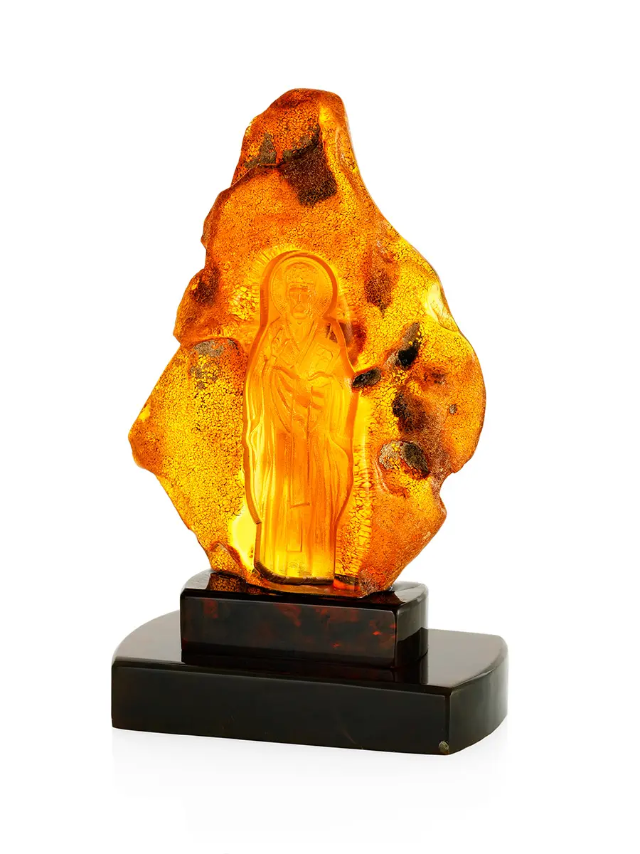 картинка Икона из натурального цельного янтаря с резьбой «Николай Чудотворец» в онлайн магазине