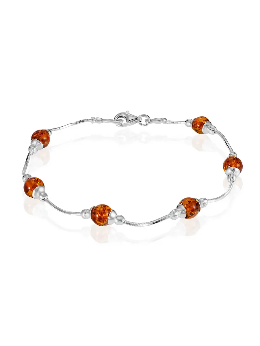 картинка Изящный тонкий браслет «Карамель» с коньячным янтарём в онлайн магазине