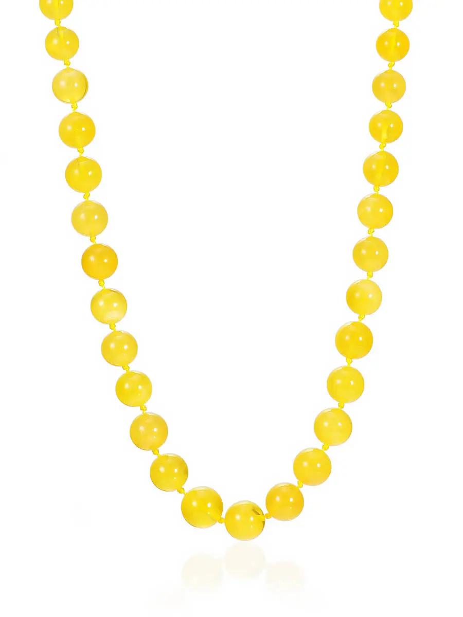 картинка Бусы из натурального полупрозрачного янтаря медового цвета «Шар» в онлайн магазине